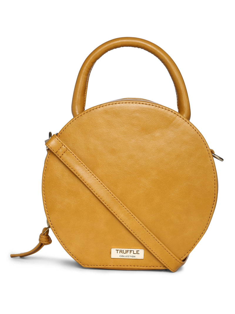 Round mustard ocre sling bag